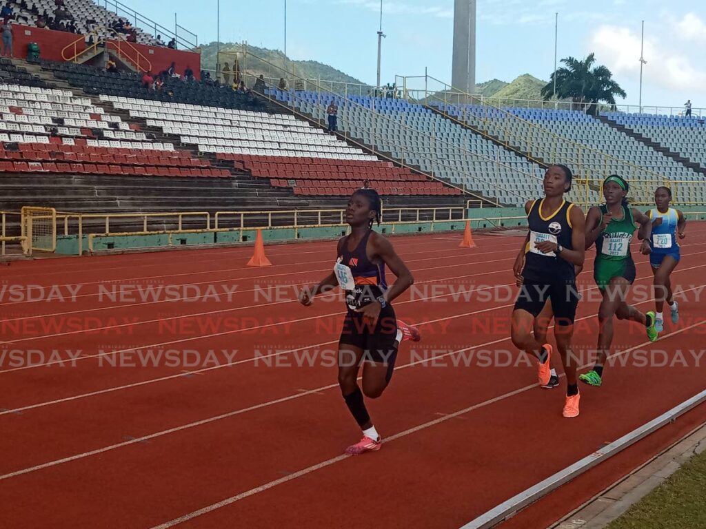 Aniqah Bailey leads the field in the girls Under-17 800m event at the NAAA Track and Field Series Three at the Hasely Crawford Stadium in Mucurapo on Sunday. - Jelani Beckles