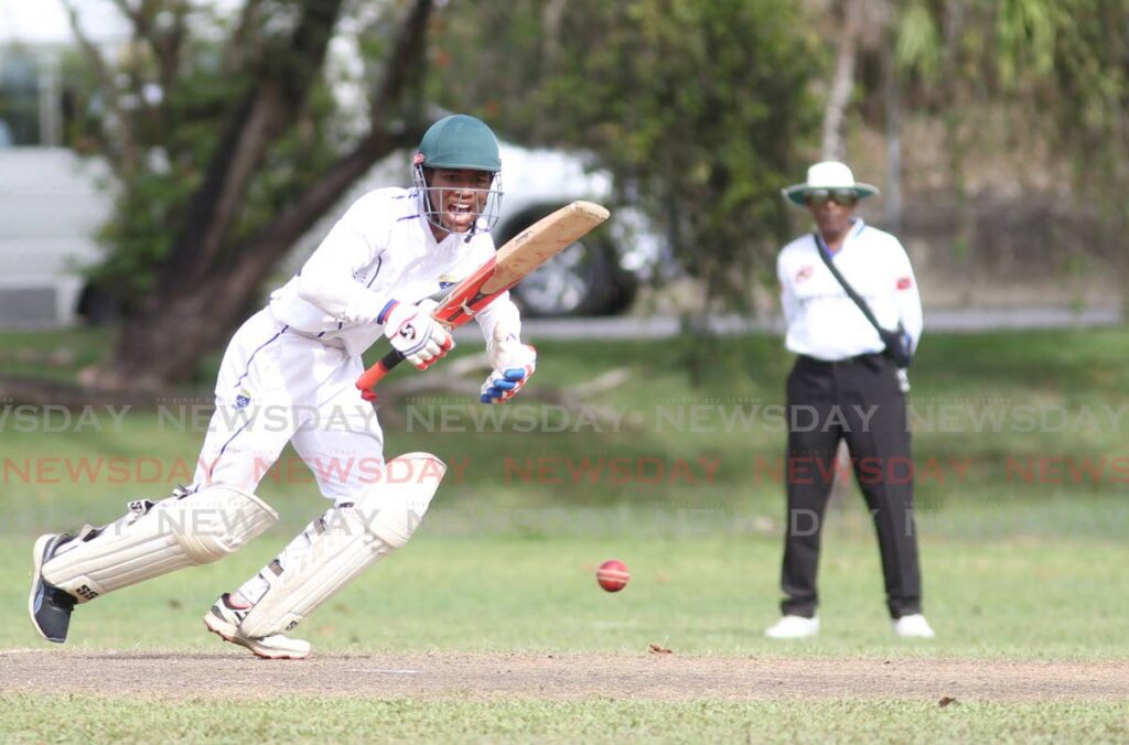 Fatima College's Isaiah Fernandes plays a shot during the Secondary Schools Cricket League Premiership match, on Tuesday, against Naparima, at Lewis Street, San Fernando. - Marvin Hamilton