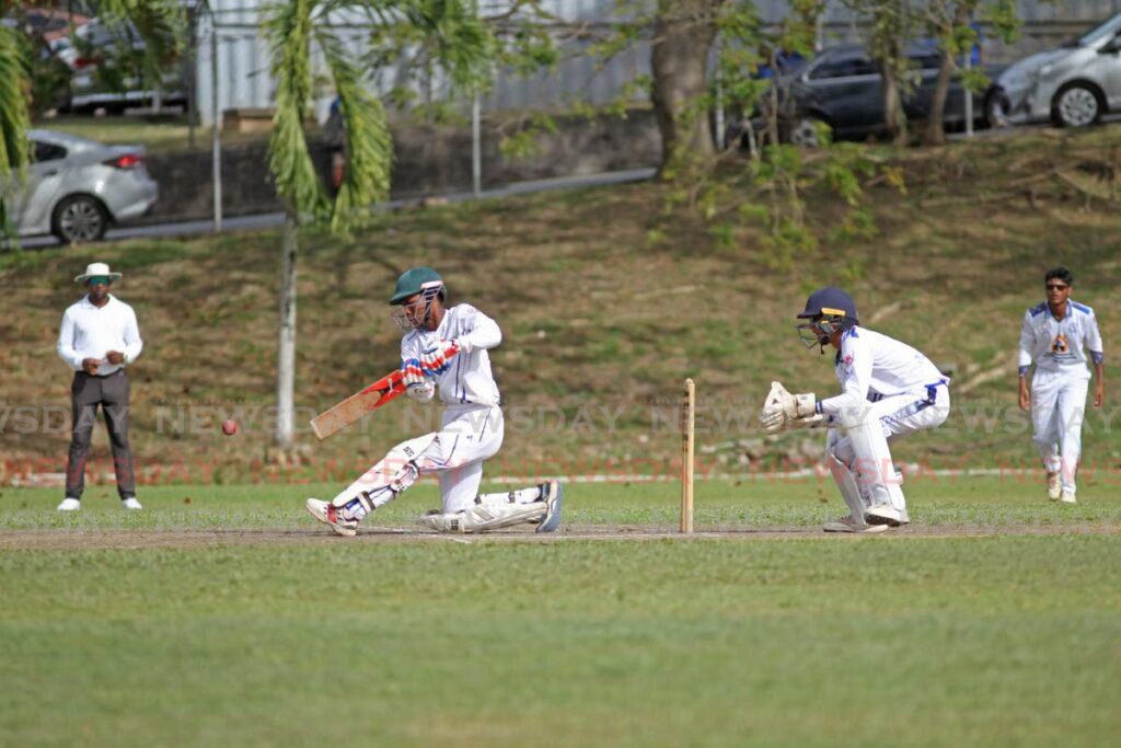 In this photo taken on February 2, Fatima Isaiah Fernandes plays a shot during his knock of 47 runs against Naparima College in the round three match, of the Secondary Schools Cricket League. Fatima face Presentation College San Fernando, on Tuesday. - Marvin Hamilton