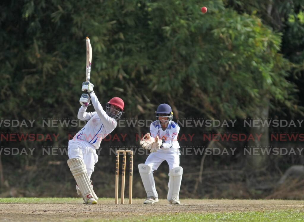 Fatima’s Zachary Siewah plays a shot during the SSCL match, on Tuesday, against Naparima, at Lewis Street, San Fernando. - Marvin Hamilton