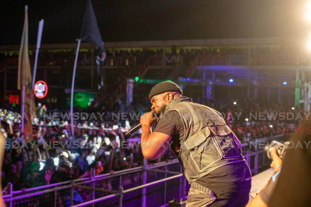 Bunji Garlin performs his monster hit Hard Fete at the Army Fete early Saturday at the Queen's Park Savannah, Port of Spain. - Photo by Jordon Briggs