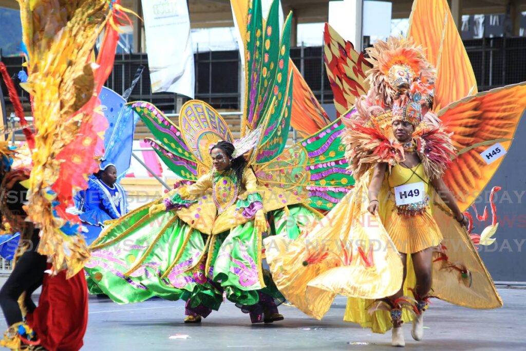 Competitors in the Girls' 14-17 years category on stage during the Red Cross Children's Carnival parade, Queen's Park Savannah, Port of Spain on Saturday. - ROGER JACOB