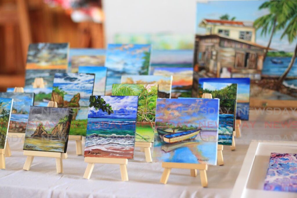 Miniature canvas paintings by artist Paula Cooper on display at a Carnival Pop-up Shop at Veni Mange, Ariapita Avenue, Woodbrook on Sunday.  Photo by Roger Jacob