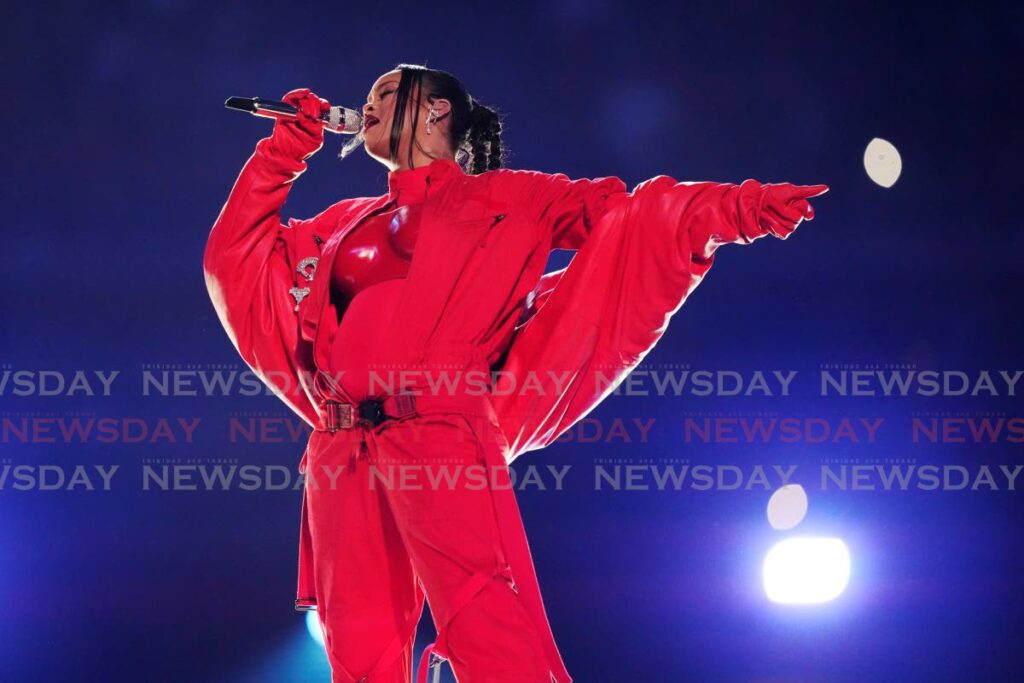 Rihanna performs during the halftime show at the Super Bowl. AP Photo - 