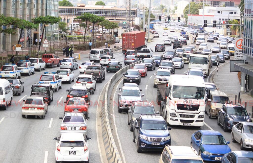Motorist navigate the heavy traffic congestion along Wrightson Road, Port of Spain, on Wednesday. - ROGER JACOB