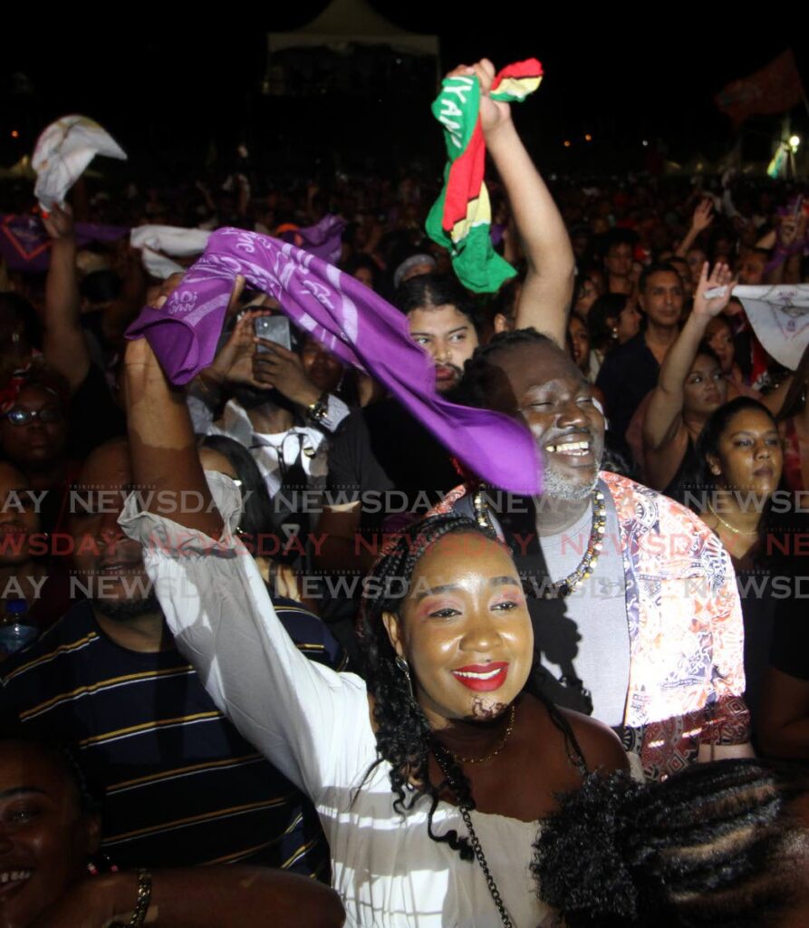 Patrons enjoy Machel Montano's concert, Hasely Crawford Stadium on Friday night.