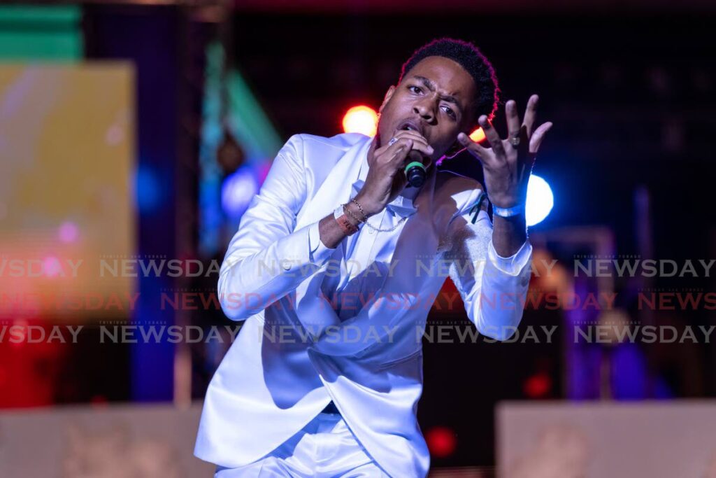 WINNING PERFORMANCE: Duane Ta'zyah O'Connor sings his way to the TUCO National Calypso Monarch crown at Dimanche Gras at Queen's Park Savannah, Port of Spain on Sunday night. PHOTO BY JEFF MAYERS - 