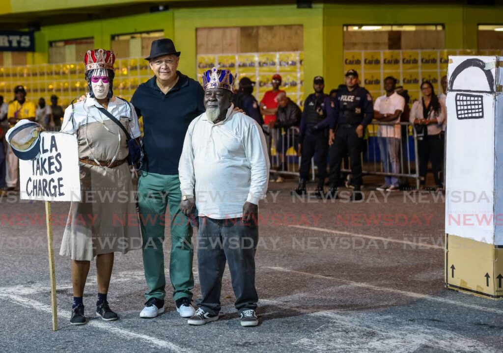 Port of Spain mayor Joel Martinez after he crowned the King and Queen of J'Ouvert - Everton Cardinal and Margaret Montano - at South Quay, Port of Spain, on Monday. - JEFF K. MAYERS