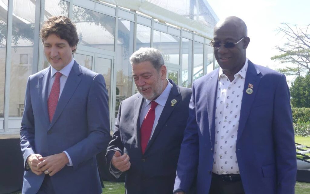 Prime Minister Dr Keith Rowley, right, with Prime Minister of St Vincent and the Grenadines Dr Ralph Gonsalves, centre, and Canada's Prime Minister Justin Trudeau at the 44th Regular Meeting of the Caricom Heads of Government in Bahamas on February 16.  - Photo courtesy OPM