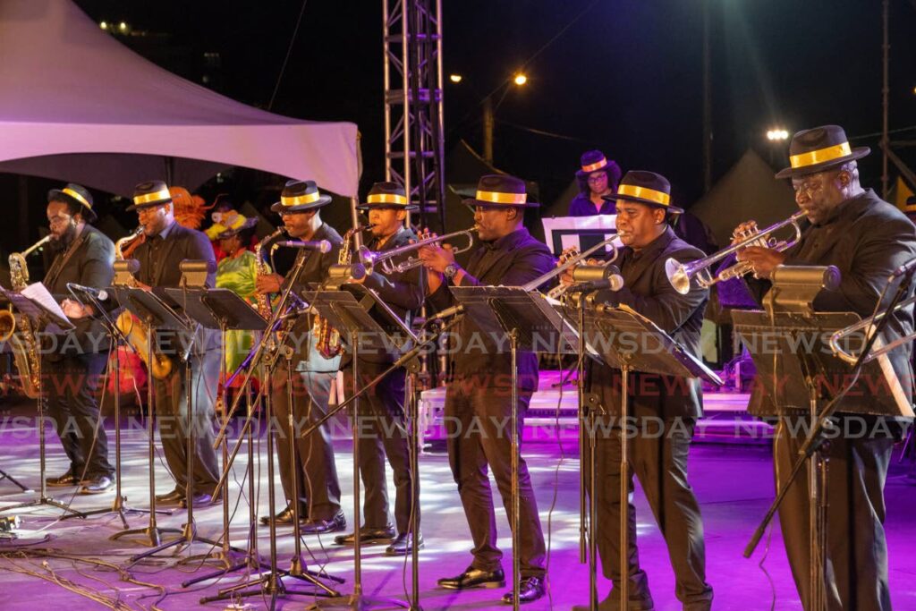 The horn section of Kern Summerville and the Sensational Band on stage of Brass Bacchanal at Queen's Park Savannah, Port of Spain on Carnival Monday. 