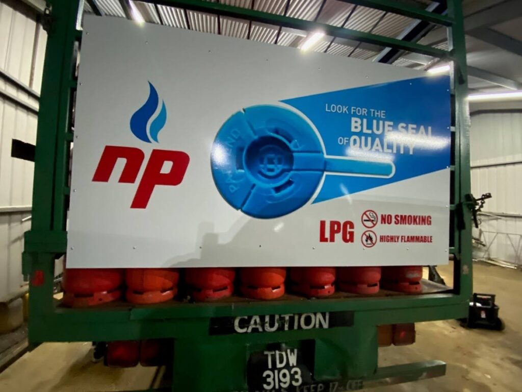 Rear view of a rebranded LPG distributor truck showcasing the NP Gas logo and the brand’s blue seal of quality.  - Courtesy NP
