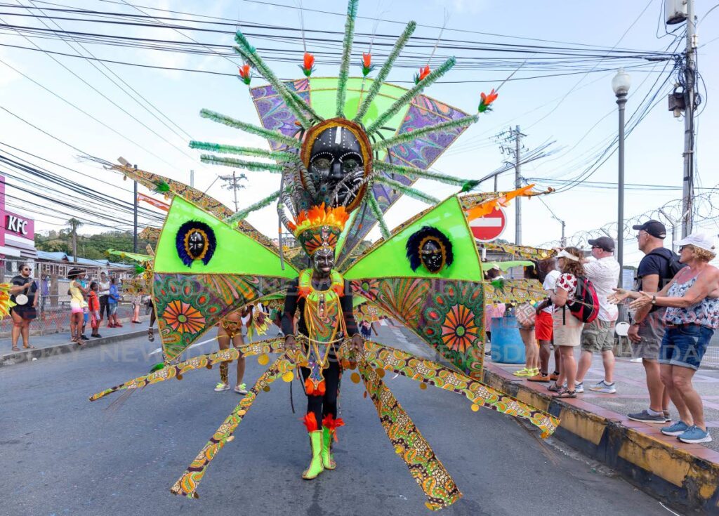 Senior King of the Bands 2023 Ryan Birchwood, of Gloria Stoute Creation, parades along Milford Road, Scarborough, Carnival Tuesday. Photo by David Reid