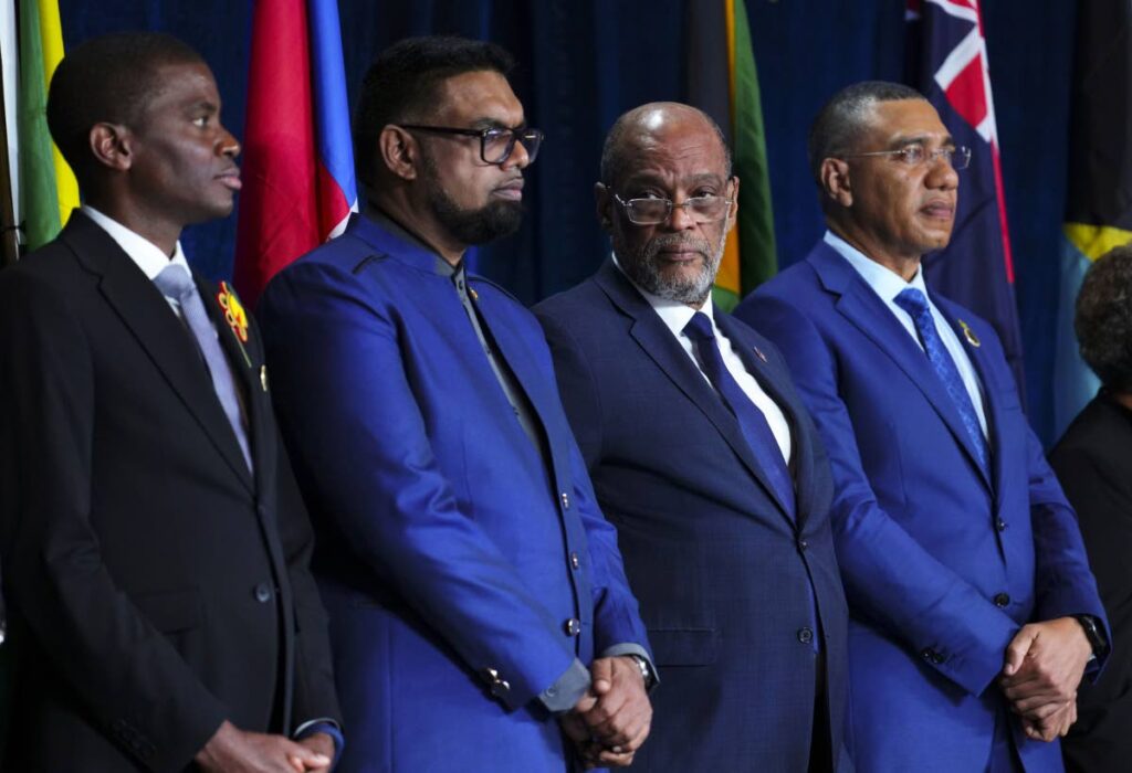 Prime Minister of Grenada Dickon Mitchell, left to right, President of Guyana Irfaan Ali, Prime Minister of Haiti Ariel Henry and Prime Minister of Jamaica Andrew Holness take part in the opening ceremony of the Conference of Heads of Government of the Caribbean Community in Nassau, Bahamas, on February 15. AP Photo - 