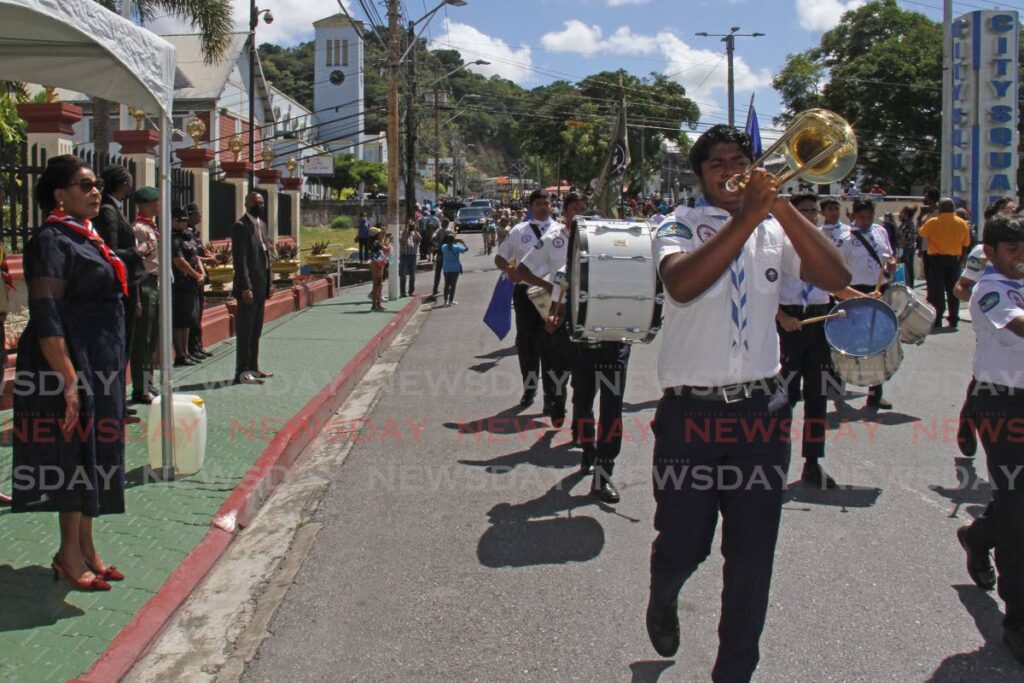 President Paula-Mae Weekes takes a final salute as Chief Scout during a parade for the Scouts Founders' Day celebration at Harris Promenade, San Fernando on Sunday. - Marvin Hamilton