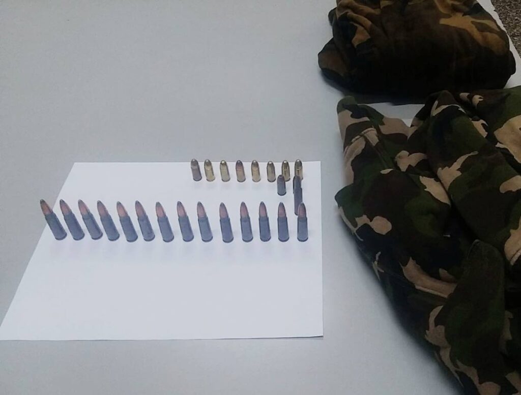 Port of Spain police found and seized camouflage fatigues and a quantity of ammunition in Belmont on Saturday afternoon. 

PHOTO COURTESY TTPS - PHOTO COURTESY TTPS