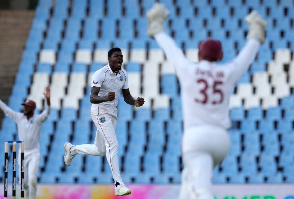 West Indies's bowler Alzarri Joseph celebrates after dismissing South Africa's captain Temba Bavuma for a duck on day one of the 1st Test, at Centurion Park in Pretoria, South Africa, Tuesday. - AP