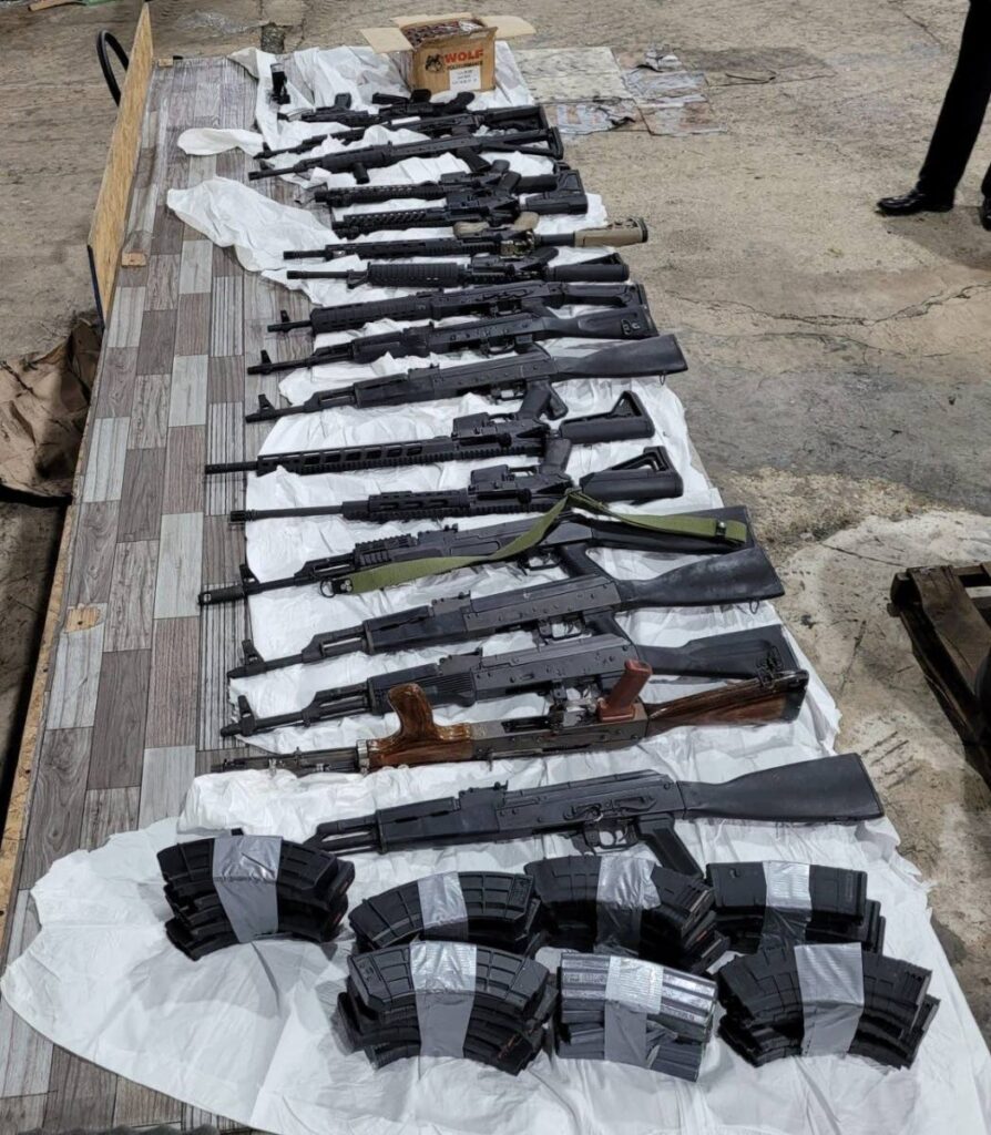 A cache of high-powered weapons which were seized at a Central warehouse after they wer illegally imported into the country. - Photo courtesy TTPS