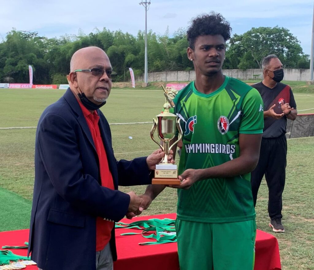 In this file photo, Kyle Ramdoo receives an award from TT Cricket Board (TTCB) president Azim Bassarath. Ramdoo struck a century in the TTCB Under-19 Inter-Zone tournament on Thursday. - TTCB
