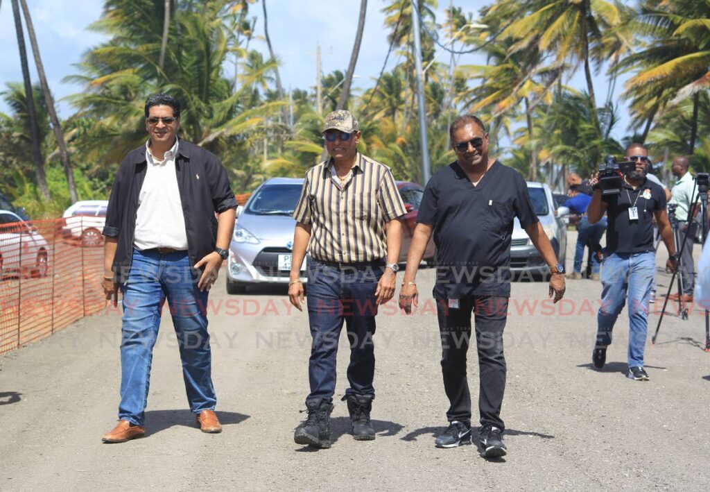 FILE PHOTO: From left, Mayaro MP Rushton Paray, Works Minister Rohan Sinanan and Cumuto/Manzanilla MP Dr Rai Ragbir walk along the $14 million Manzanilla/Mayaro bypass road at its opening on January 2. - ROGER JACOB