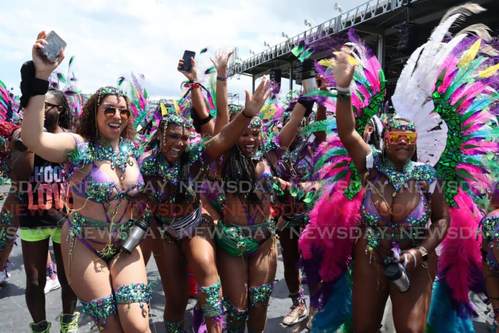 Yuma masqueraders enjoy the revelry at Queen's Park Savannah, Port of Spain on Carnival Tuesday, February 21. - ROGER JACOB