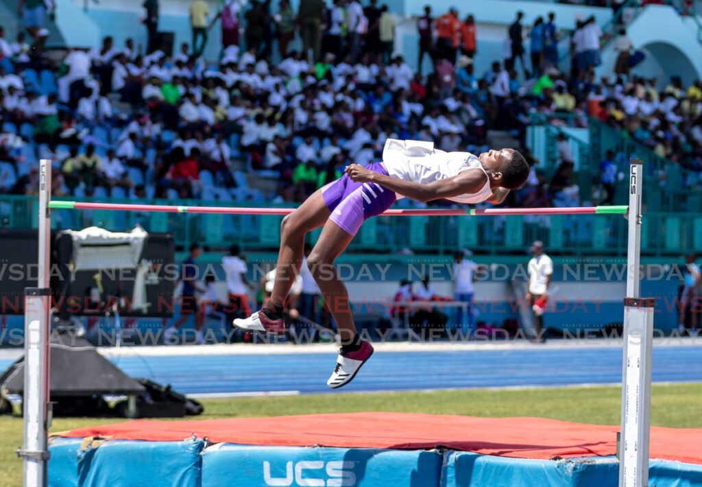 Terique Vincent, of Woodbrook Secondary School, competes in the high jump in the boys 15 plus high jump in the National Secondary School Track and Field Championships on Wednesday, at the Dwight Yorke Stadium. - Photo by David Reid
