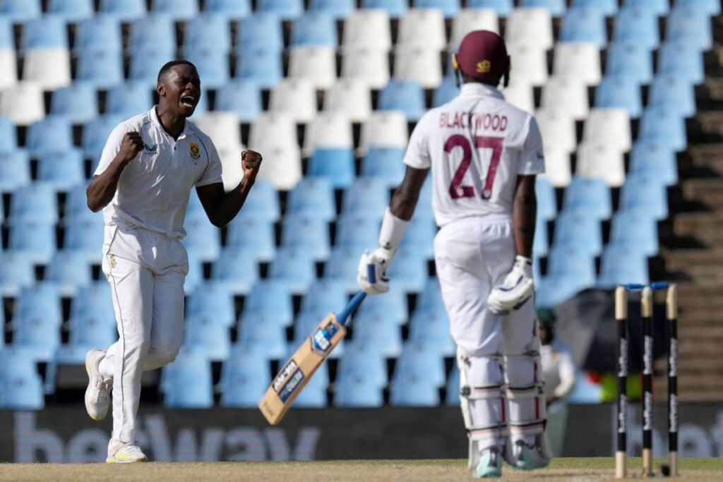 South Africa's bowler Kagiso Rabada, left, reacts after dismissing West Indies' batsman Jermaine Blackwood for 79 runs during the third day of the first Test at Centurion Park in Pretoria, South Africa, on Thursday. - AP PHOTO
