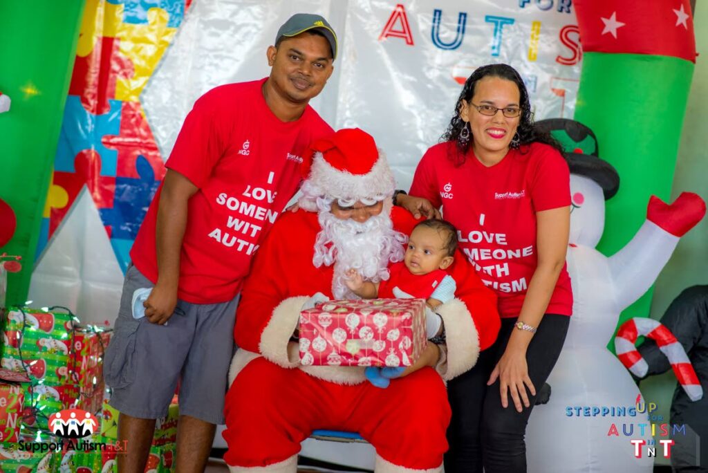 Alicia and Steve at an autism event with their son Lucantoni. 
Photo Courtesy - Keegan Callender - Photo Courtesy - Keegan Callender