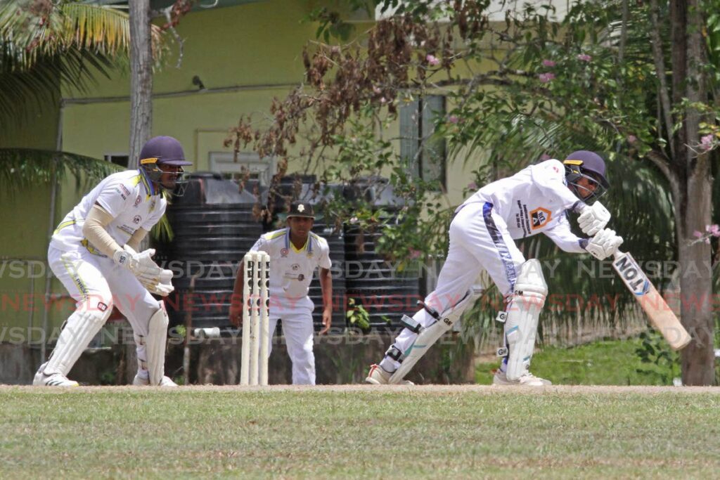 In this photo taken on March 7, Naparima College batsman Jonathan Ramnarace plays a shot against Presentation College San Fernando, during the premier division match of the Secondary Schools Cricket League, at Union Hall Grounds. - Marvin Hamilton