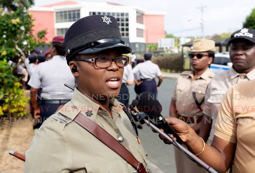 Acting ASP Karen Stewart-Duncan speaks to the media in Scarborough on Wednesday during an International Women's Day parade.  Photo by David Reid
