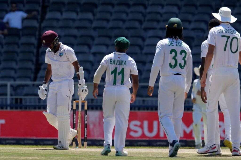 West Indies's captain Kraigg Brathwaite leaves the pitch after being dismissed by South Africa's bowler Kagiso Rabada, for 18 runs during the fourth day of the second Test, at the Wanderers Stadium in Johannesburg, South Africa, on Saturday. - AP PHOTO
