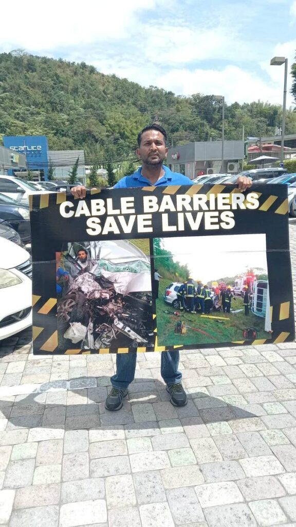 Accident survivor Yousuf Hosein at Shoppes of Maraval advocating for cable barriers to be installed and repaired along  highways.  - Photo courtesy Yousuf Hosein