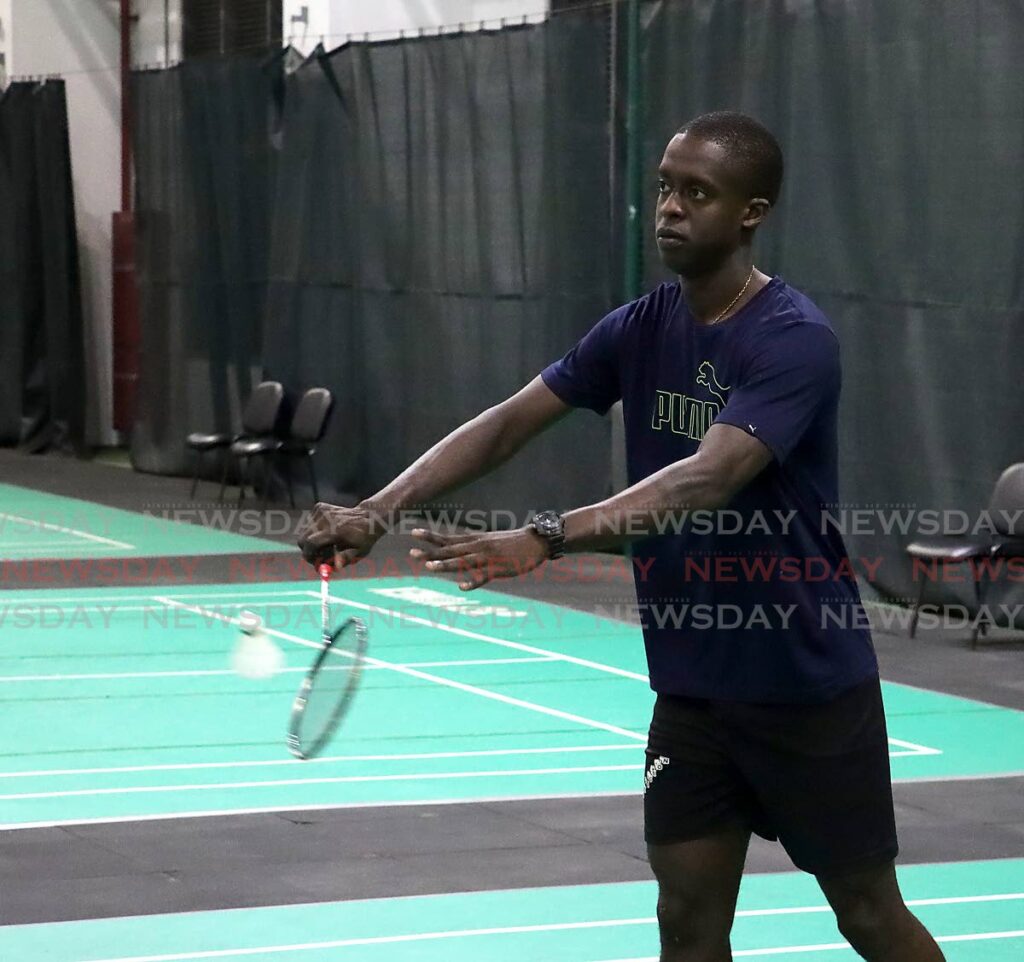 Will Lee of Shuttle Force competes in the men’s singles category at the National Senior Badminton Championships 2023 at the National Racquet Centre, Tacarigua. - ROGER JACOB