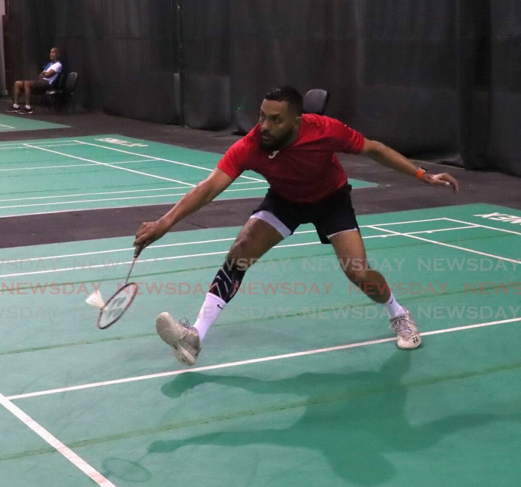 Anil Seepaul plays a return during the National Badminton Championships 2023, at the National Racquet Centre, Tacarigua, on Monday evening.  - ROGER JACOB