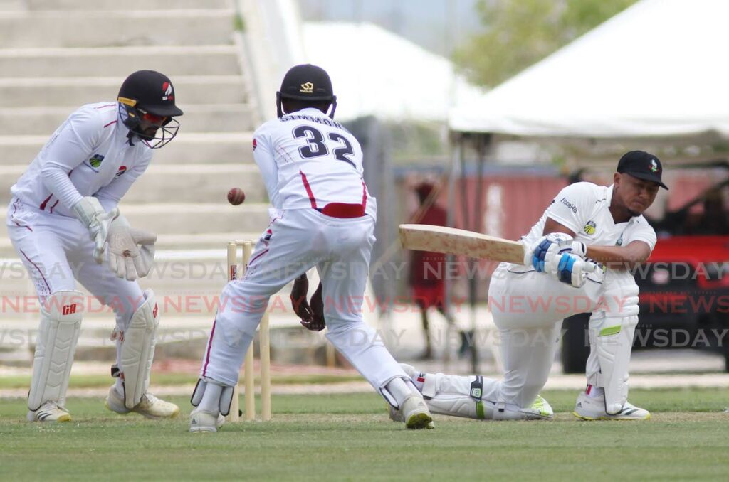 Guyana Harpy Eagles’ batsman Kemol Savory plays a shot against TT Red Force in the Cricket  West Indies Four Day Championship round three match, on Wednesday, at the Brian Lara Cricket Academy , Tarouba. - Lincoln Holder