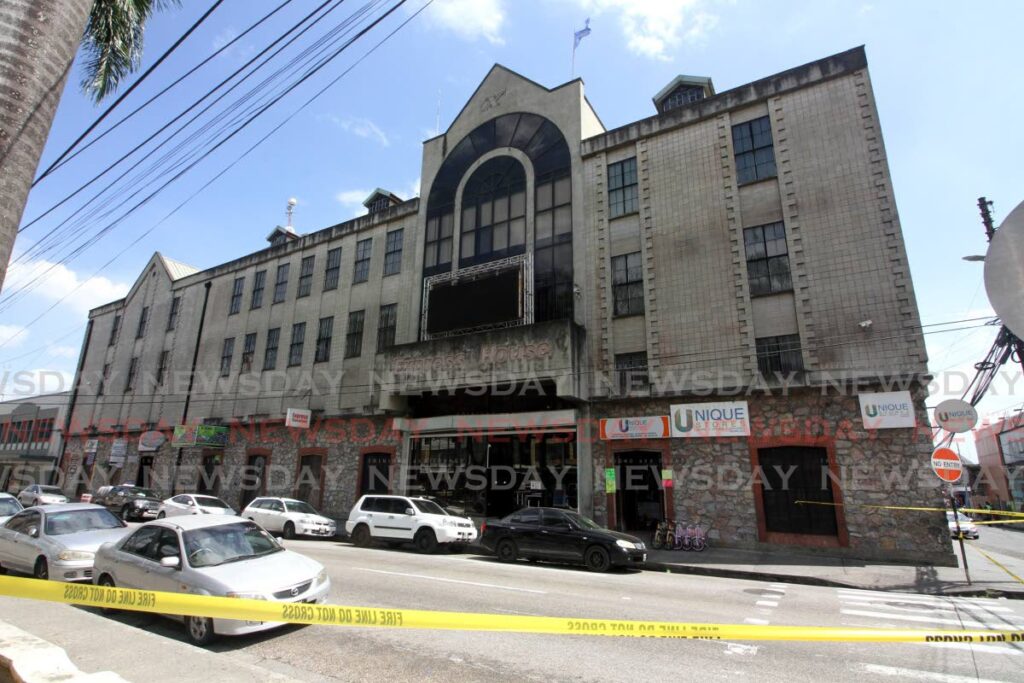 The area around Express House, Port of Spain was cordoned of as a bomb threat was being investigated on Thursday. Photo by Angelo Marcelle