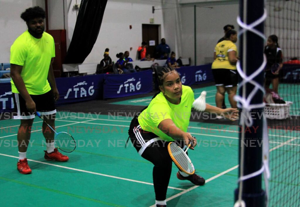 Rachel Ragoonanan returns the shuttle in a mixed doubles semifinal alongside Nathaniel Khillawan during the National Badminton Championships at the National Racquet Centre, Tacariqua - Photo by Ayanna Kinsale