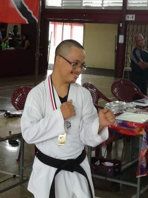 Surya Hosein represents TT in taekwondo games with other special-needs athletes. For Special Olympics he has a collection of medals for swimming and bocce.