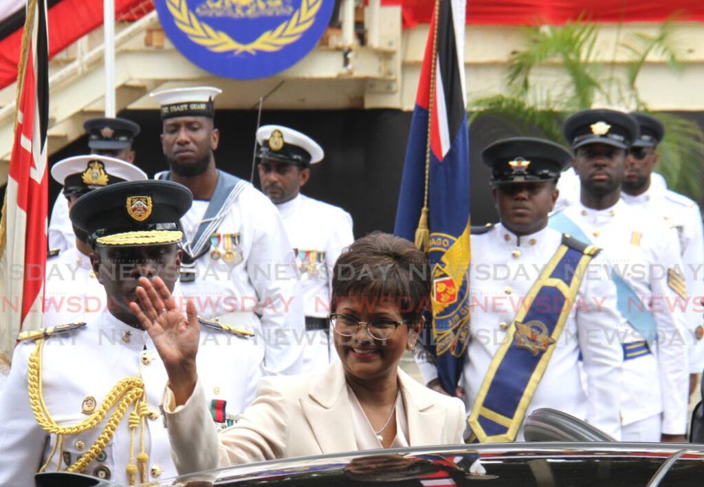 COMMANDER IN CHIEF: President Christine Kangaloo waves as she leaves the Queen's Park Savannah on Monday after her inauguration. PHOTO BY AYANNA KINSALE - 