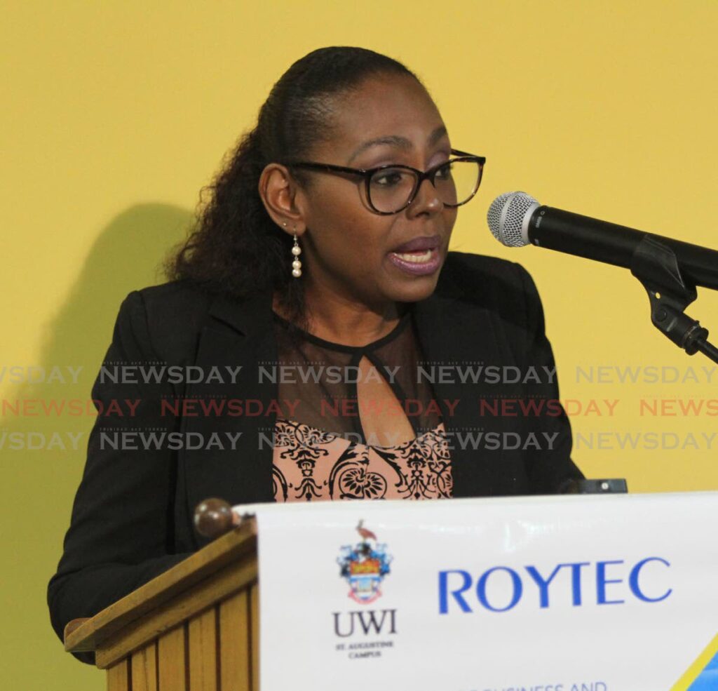 UWI-Roytec's Academic Affairs Director Genevieve Julien, give her remarks, at the renaming ceremony of their library in honour of former lecturer Dr. Allan Mc Kenzie, at UWI-Roytec, Henry Street, Port of Spain on Tuesday. - Photo by Angelo Marcelle