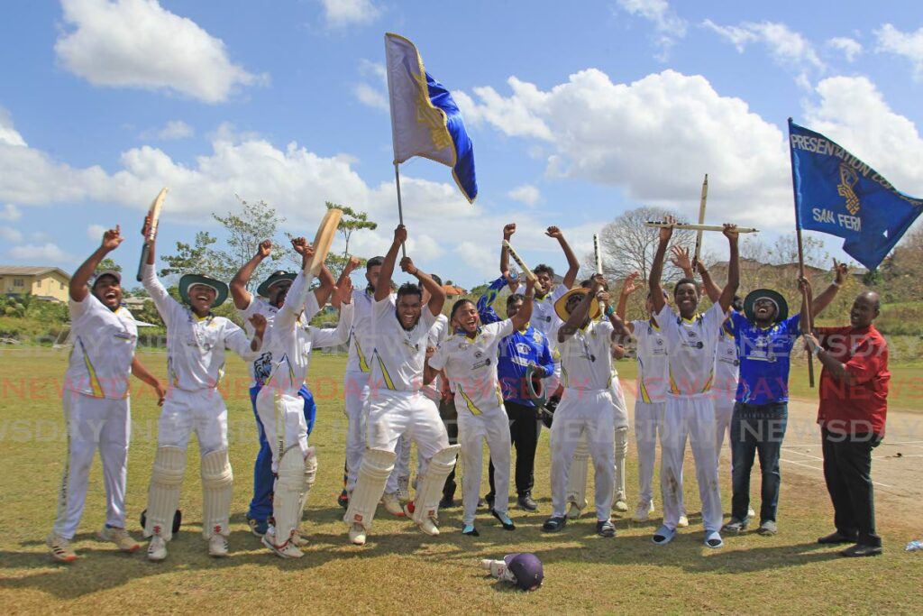 CHAMPS: Presentation College cricketers and officials celebrate after beating St Benedict's College, on Tuesday, during the SSCL Premier Division match, at the Union Hall recreation Grounds, San Fernando. Pres won the match by nine wickets and were crowned the Secondary Schools Cricket League champions.  - Marvin Hamilton