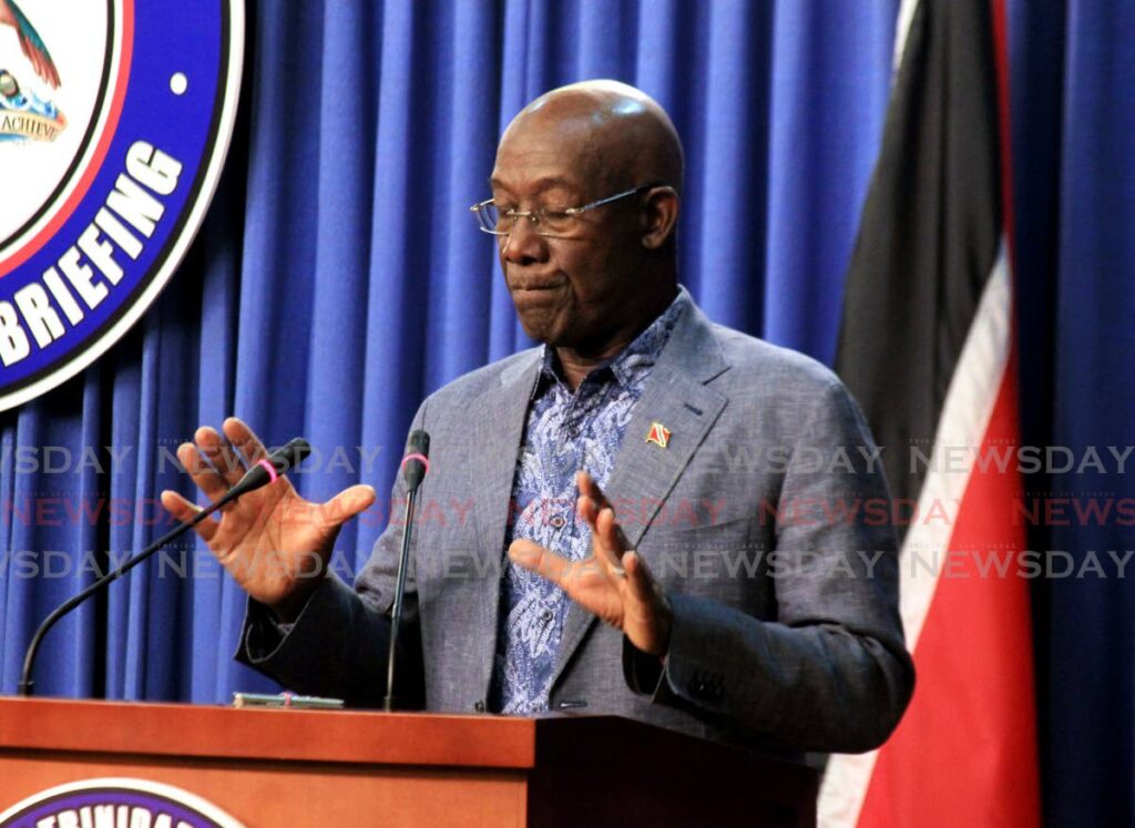 NOT ME: Prime Minister Dr Keith Rowley speaks to reporters during the post Cabinet press conference at the Diplomatic Centre in St Ann's on Thursday. PHOTO BY AYANNA KINSALE - 