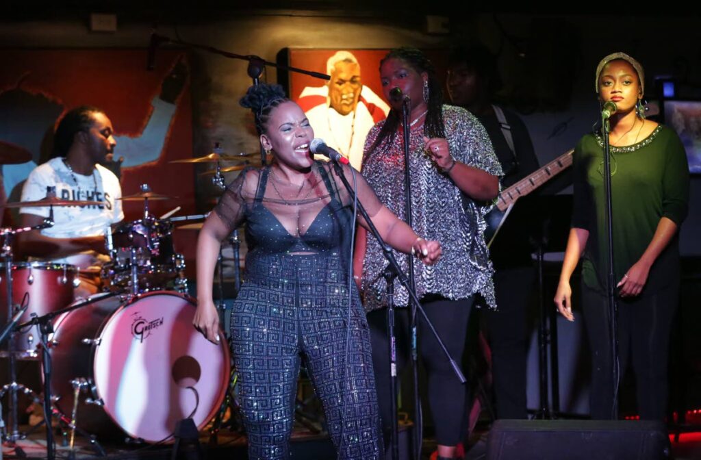 Calypsonian Tammico “SpiceY” Moore performs at Kaiso Blues Cafe, Port of Spain, in 2019. Photo by Andrea De Silva. - 