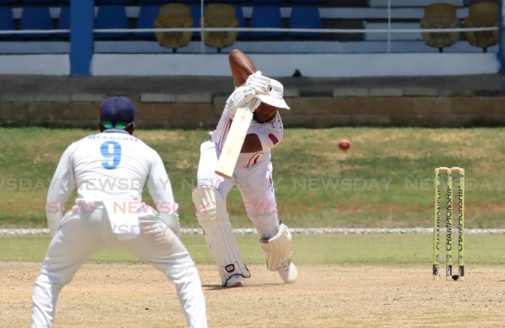 Red Force batsman Jyd Goolie plays a shot against Barbados at the Queen's Park Oval, St Clair, Friday. - ROGER JACOB