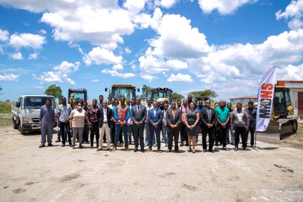 Government Ministers, officials of the Ministry of Youth Development and National Service and NESC Technical Institute stand will successful applicants of the A.L.L. S.E.T. Programme which started on Monday. - Photo courtesy Youth Development Ministry 