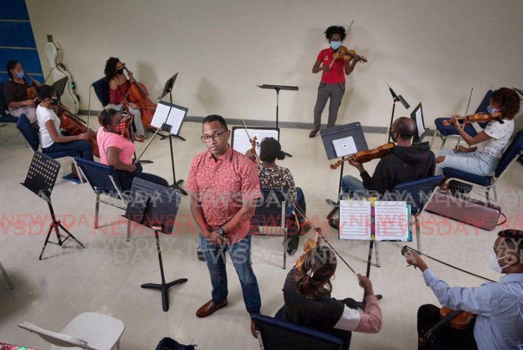 Dr Roger Henry in rehearsal with the National Philharmonic Orchestra. - 