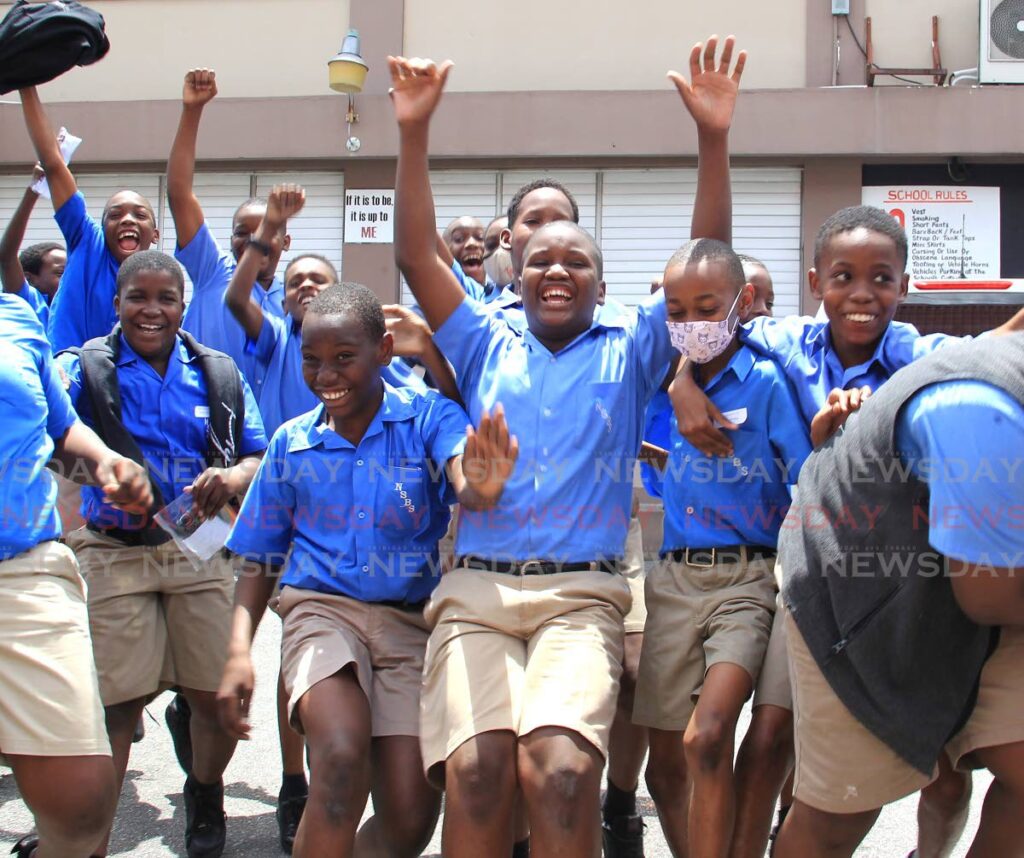 Pupils from Nelson Street Boys RC School rejoice after completing the SEA exam. - Photo by Ayanna Kinsale