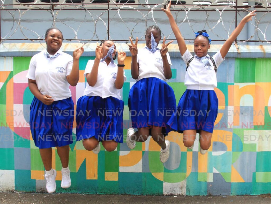 From left, Akila Pompey, Jovanna Jordan, Amelia George, and Dillyann Irving jump for joy after being the only sudents from Nelson Street Girls' RC School to write the SEA exam.

JUMP FOR JOY: From left, Akila Pompey, Jovanna Jordan, Amelia George and Dillyann Irving jump for joy after writing the SEA exam at Nelson Street Girls RC Primary School on Wednesay. Photo by Ayanna Kinsale