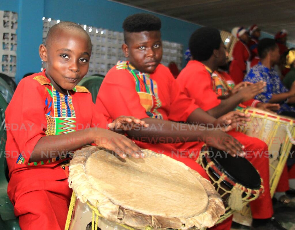 Angel Michael Healing Tabernacle drummers keep the rhythm going during Spirtual Shouter Baptist Liberation Day celebrations, Ark of the Covenant Empowerment Hall, Maloney on Thursday. - AYANNA KINSALE