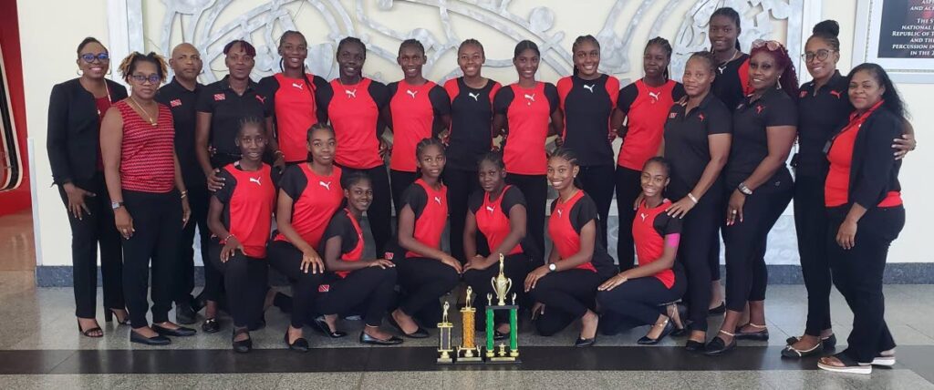 The TT under-16 netball team and technical staff at the Piarco International Airport on Thursday. PHOTO COURTESY TT NETBALL ASSOCIATION - 