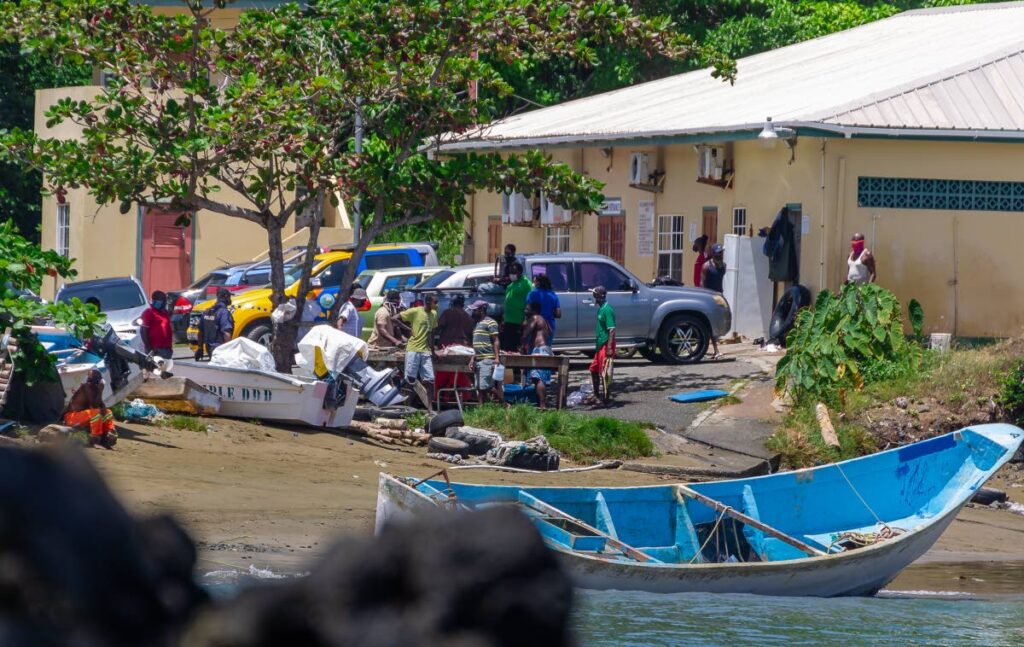 In this May 2021 file photo, police check the vessel which was pulled on shore at Belle Garden, Tobago.